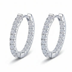 Sterling silver huggie hoop earrings, side view, with round moissanite stone rows