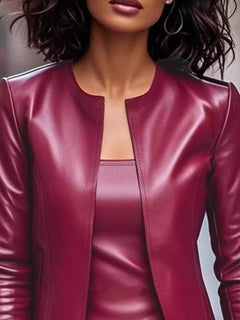 Burgundy leather open-front jacket close-up with V neckline and seams