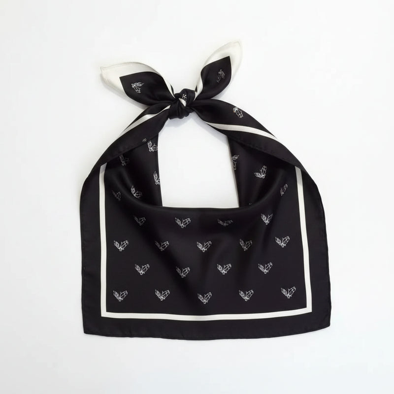 Lightweight silk scarf, black with white printed border and bow-tied ends