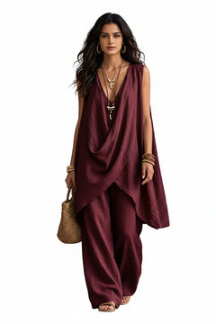 Sleeveless asymmetrical top and wide-leg pants set in burgundy, draped crossover front