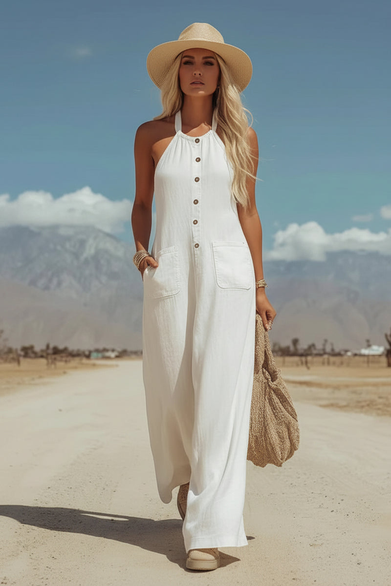 White halter neck wide-leg jumpsuit with button front and patch pockets