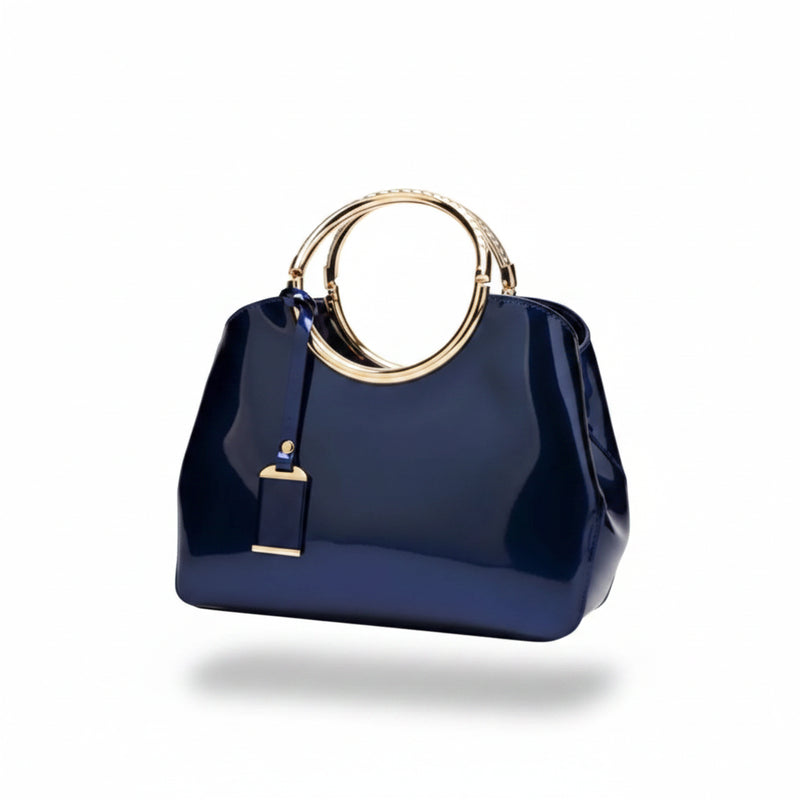 Indigo glossy handbag with round ring handle and small tag detail