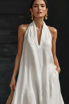 White halter neck sleeveless maxi dress with V-neck and draped bodice