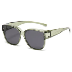 Matcha green sunglasses with dark lenses and rectangular frames