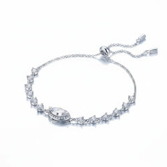 Sterling silver moissanite bracelet with detailed square links and oval center halo