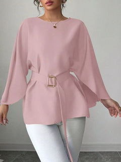Blush pink batwing blouse with draped sleeves and belted waist with buckle