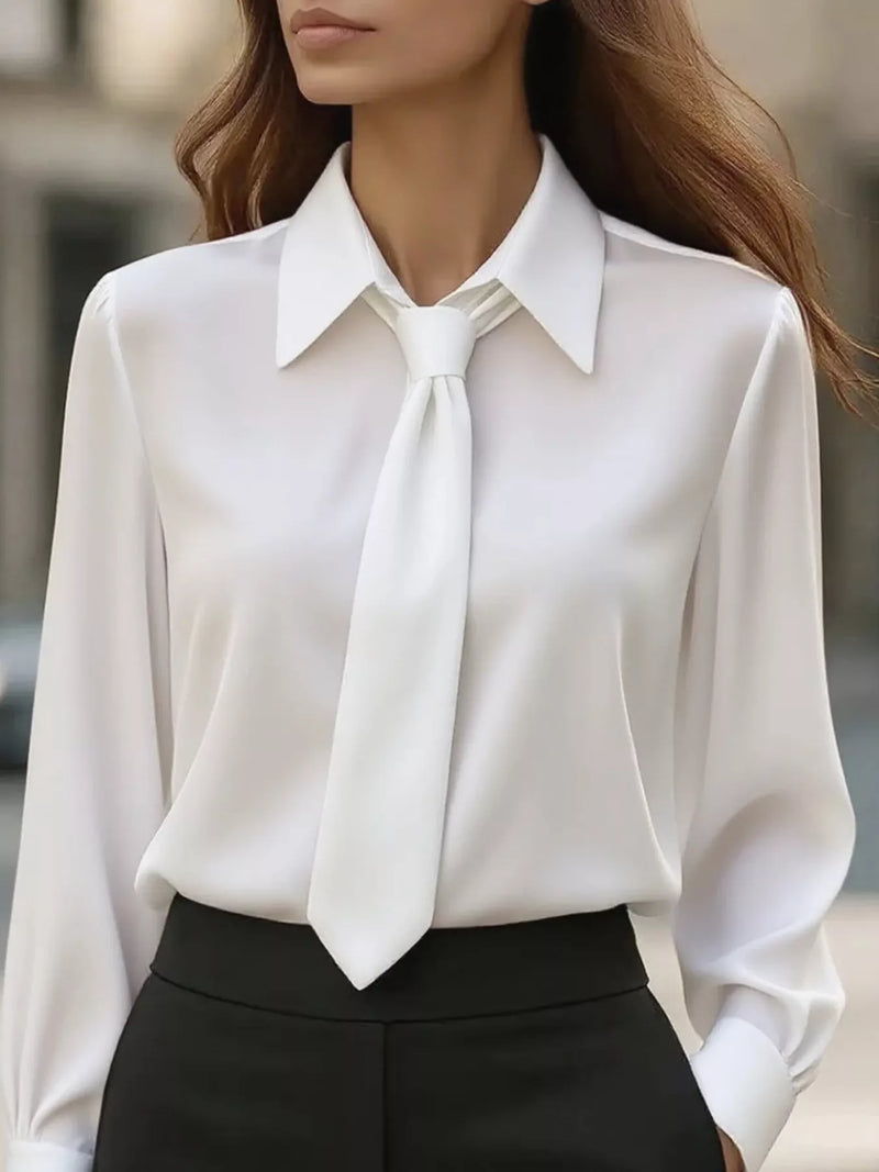 White collared long-sleeve blouse with bow tie neck