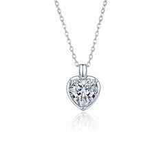 Heart-shaped moissanite pendant necklace in sterling silver with single stone