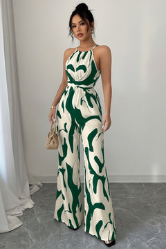 Sleeveless wide-leg jumpsuit with green abstract print and waist tie
