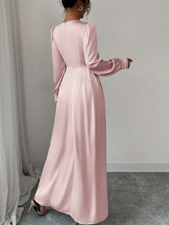 Blush pink satin long-sleeve maxi dress with back seam and flowing skirt