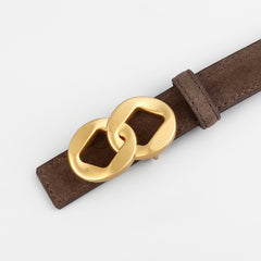 Brown leather belt strap with gold double-ring buckle close-up