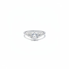 Sterling silver moissanite ring front view with round center stone and two side stones