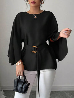 Black batwing sleeve belted blouse with square buckle at waist, draped flare hem