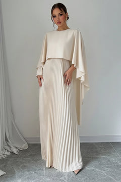 Cream pleated maxi dress with flowing cape sleeves and pleated long skirt