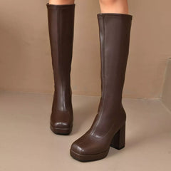Brown square-toe block heel knee-high boots, back view